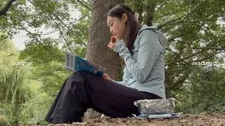 Thumbnail: reading + walking on a midsummer’s day 🍙🌳