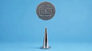 Thumbnail: A physics simulation of the YouTube logo with a steel cone