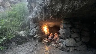 Thumbnail: Caught In Heavy Rain & Thunderstorm – Building A Survival Shelter With Fireplace | Extreme Cold