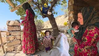Thumbnail: Building a stone pillar: a solid support for a mother and her two daughters