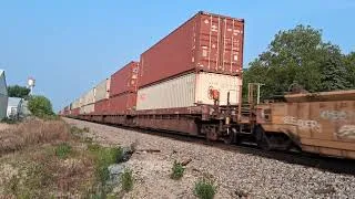 Thumbnail: BNSF 7966 leads a S train through Downtown Mazon, IL 