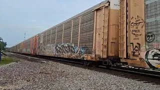 Thumbnail: BNSF 4086 leads a long Autorack train through Coal City, IL 