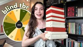 Thumbnail: BLINDLY picking my tbr for July 📚⭐️ tbr challenge