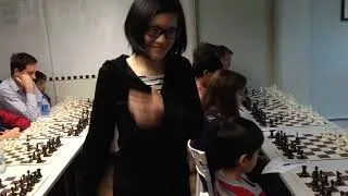 Thumbnail: 3 March 2014: GM Hou Yifan Simul at Caissa Sheung Wan centre in Hong Kong.
