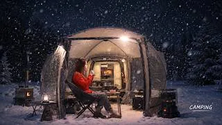 Thumbnail: A woman car-camping solo in a tent amidst falling snow