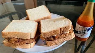 Thumbnail: New Orleans style Fried pork chop sandwiches | Fried pork chops in-between 2 slices of bread