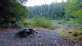 Thumbnail: Campfire build along the Smith River in Redwoods of California