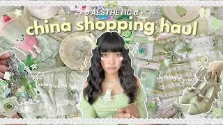 Thumbnail: CHINA HAUL 🥟🍀 aesthetic shopping, taobao finds, clothing try-on, cute trinkets, dishware, & more!
