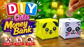 Thumbnail: DIY Easy Origami Coin Bank/No Glue, No Scissors Paper Craft/How to make Cute Paper Piggy Bank 🤍🐱