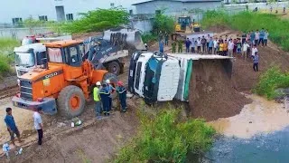 Thumbnail: Unfortunately! Dump Truck Back Uploading Overturned into Deep Hole Massive Sand Filling Gone Wrong