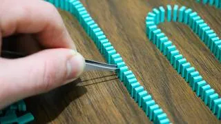 Thumbnail: Toppling the Most Mini Dominoes Ever!