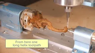 Thumbnail: Rotary CNC machining (4-axis) with toolpaths below the rotation axis
