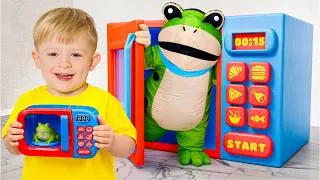 Thumbnail: Adam and Mom Pretend Play with a Toy Microwave