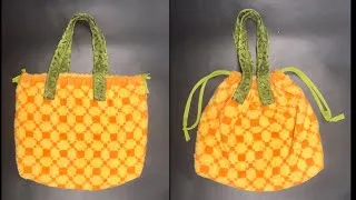 Thumbnail: Turn an Ordinary Towel Into a Handy Drawstring Bag**