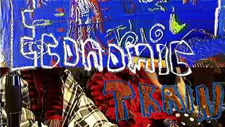 Thumbnail: Lee "Scratch" Perry & Mouse On Mars - Economic Train (Official Visualiser)