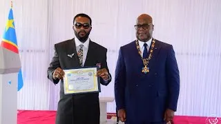 Thumbnail: FALLY IPUPA DECORÉ DE LA MEDAILLE DE L'ORDRE DU LEONARD. LA CONSECRATION D'UNE CARRIERE D'ARTISTE.