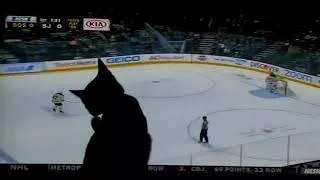 Thumbnail: Cat watching Bruins game