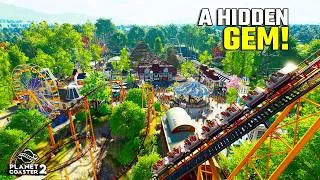Thumbnail: This Park Feels Like It’s Been Here for 70 Years… | Planet Coaster 2 Spotlight