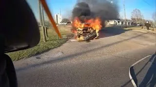 Thumbnail: Fully involved car fire with fuel leak. 