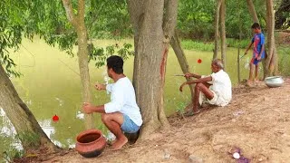 Thumbnail: Fishing Video || Using the techniques taught by Grandpa two skilled boys caught fish from the pond
