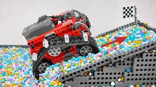 Thumbnail: ASMR LEGO Cars vs Colored Gravel Challenge | FM Lego Technic