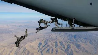 Thumbnail: US, Qatar, Saudi Arabia & Allied Paratroopers Conduct Free Fall From C-130J