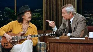 Thumbnail: Johnny Carson Dared Carlos Santana to Play Whitney Houston on Guitar—The Studio Went Dead Silent!