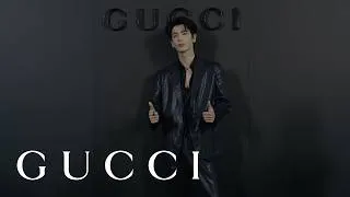 Thumbnail: Guests at the GucciCore Fashion Show