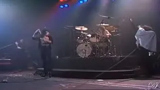 Thumbnail: Roger Taylor thrashing his drums