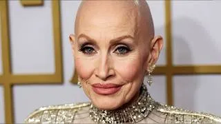 Thumbnail: Dolly Parton's Iconic Hair Has Come A Long Way