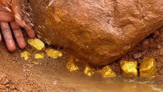 Thumbnail: Finding and digging treasure gold under stone at mountain