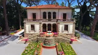 Thumbnail: Historic liberty villa with private tennis court in Tuscany