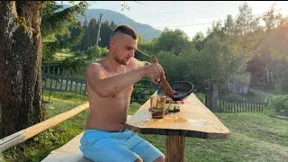 Thumbnail: DIY summer shower near an old grandfather's hut. Rural life, meat on the fire