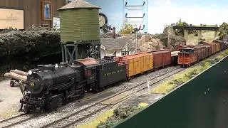 Thumbnail: What on Earth is a Double Saw By? - Tricks to get long trains through short sidings in HO Scale