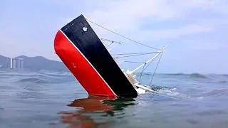 Thumbnail: Cardboard ships sinking at sea, scale model ships, underwater footage