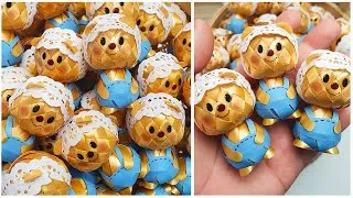 Thumbnail: สอนทำเหรียญโปรยทาน “หมีเนย” น่ารักขั้นสุด! สานง่าย ทำตามได้ | LOOKNAM RIBBON ART