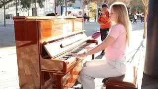 Thumbnail: Lara plays Baba Yetu on an outdoor piano