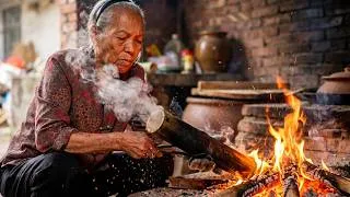 Thumbnail: You've Never Seen Bamboo Cook Like This! Grandma's Bamboo Tube Rice & Chicken Is Incredible! 🎋🔥