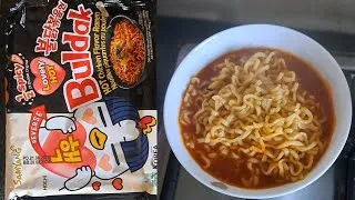 Thumbnail: Cooking 1/2 spicy buldak ramen 🍜 for the first time.