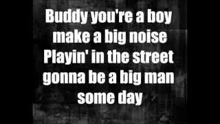 Thumbnail: We Will Rock You - Queen (Lyrics)