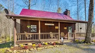 Thumbnail: Cozy Wooden Cabin in the Forest with a Red Roof and Spacious Front Porch | Lovely Tiny House