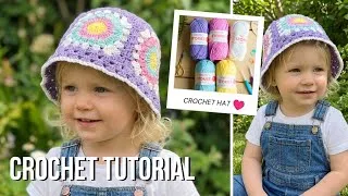 Thumbnail: Sunny Stitches 🌼 Crochet Bucket Hat Pattern 🧶 | Easy Granny Square Hat Tutorial (Baby - Adult Sizes)