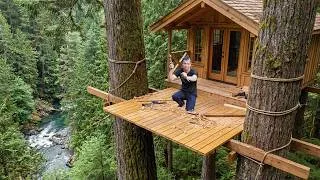 Thumbnail: Man Builds a Log Cabin Between Two Giant Trees — Alone From Start to Finish