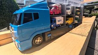 Thumbnail: 13 new Tomica cars join the lineup! Race them on the track, then store them in the Cleanup Convoy!