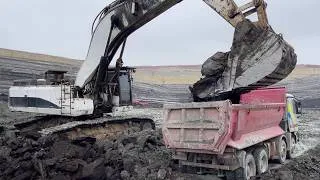 Thumbnail: Caterpillar 375 Excavator Loading Overburden On A Fleet Of Mercedes And MAN Trucks