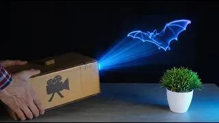 Thumbnail: I Turned a Cardboard Box into a REAL Movie Projector! 🎥
