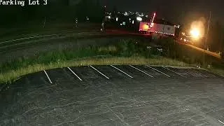 Thumbnail: Semi-truck’s trailer split in half by train