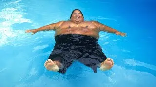 Thumbnail: Israel "IZ" Kamakawiwoʻole - Over the Rainbow (Official Lyric Video)
