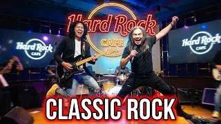 Thumbnail: Queen - The Tribute cover by Hubris Band with Joel, Mike and Darlyn on vocals Hard Rock Cafe Bangkok