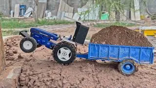 Thumbnail: Remote control homemade tractor Farmtrac with Loded trolley working in new project @MrPendujatt22 